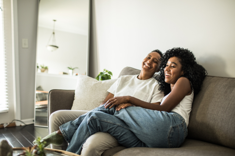 Two People Lounging On A Couch - Entour botanical specialists - featuring terpenes and aromatic flavors